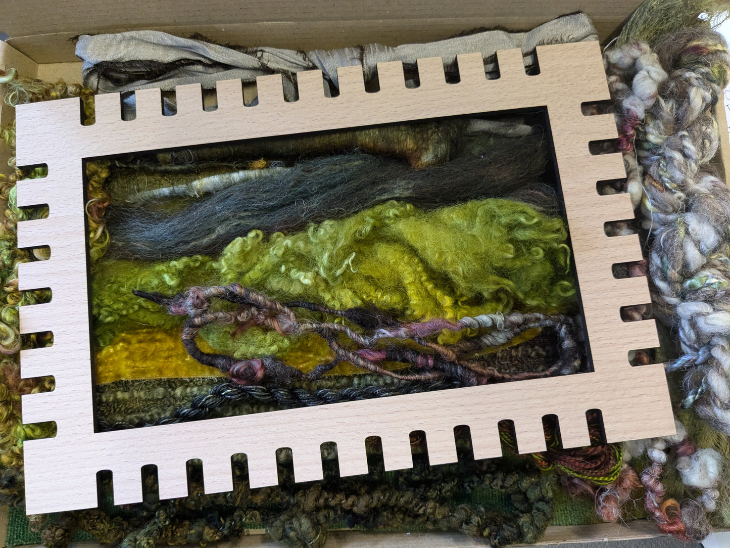 Moss, lichen and bark pack with basic weaving frame 07