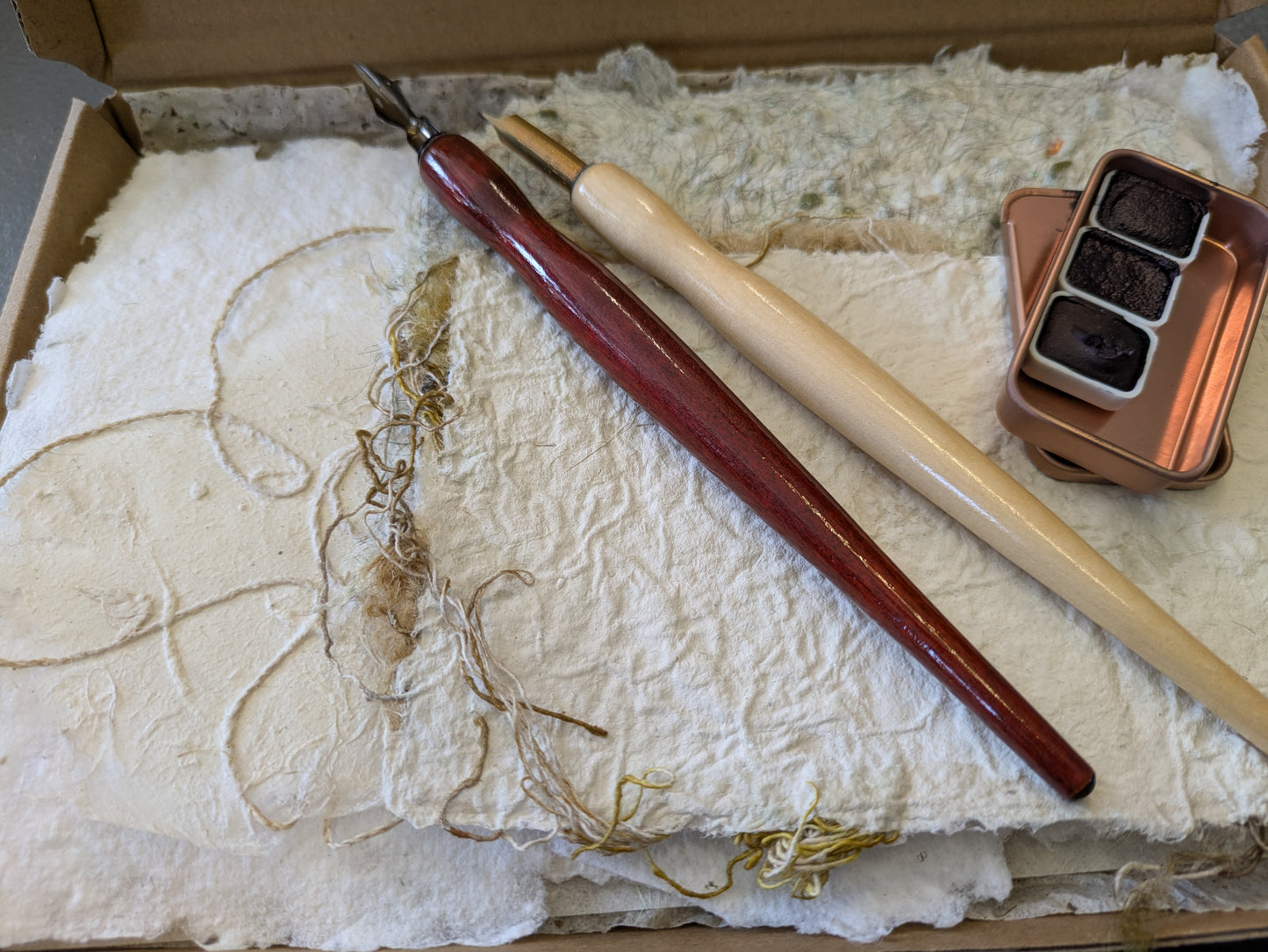 Studio destash, A5 box of hand made papers, dip pens and hand made paint MMbox04