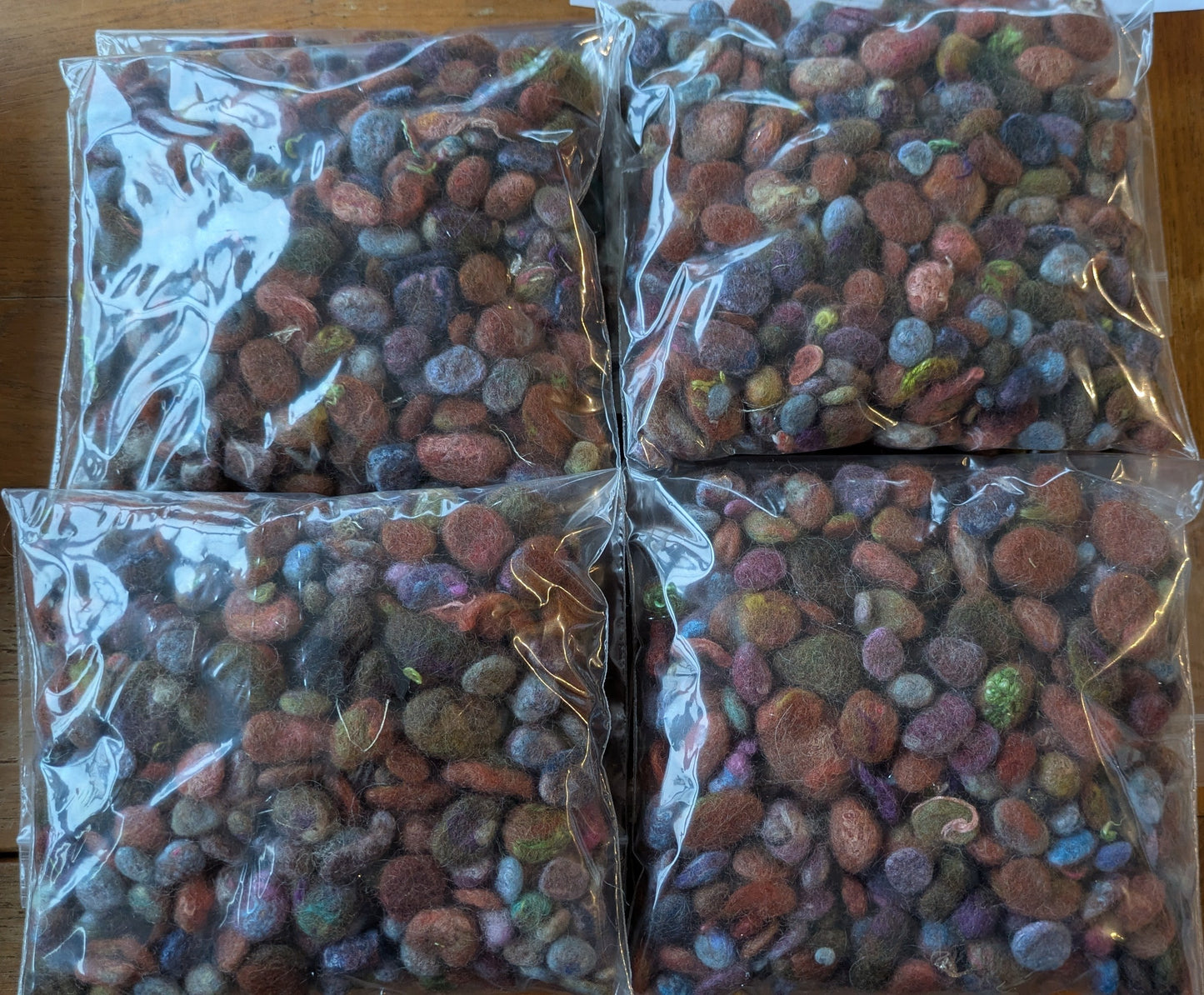 25g pebbles - mix of hand-dyed and natural fibres and fabrics made into little pebbles - pebs21