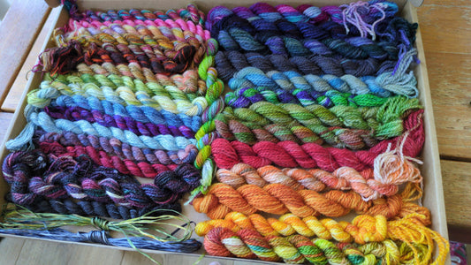 Assorted skeins of hand dyed silk threads,wool yarns, silk ribbons and raffia- a great mix of colours  - Box04