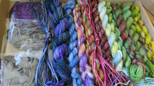 Assorted skeins of hand dyed silk threads, silk ribbons and raffia- a great mix of colours  - Box09
