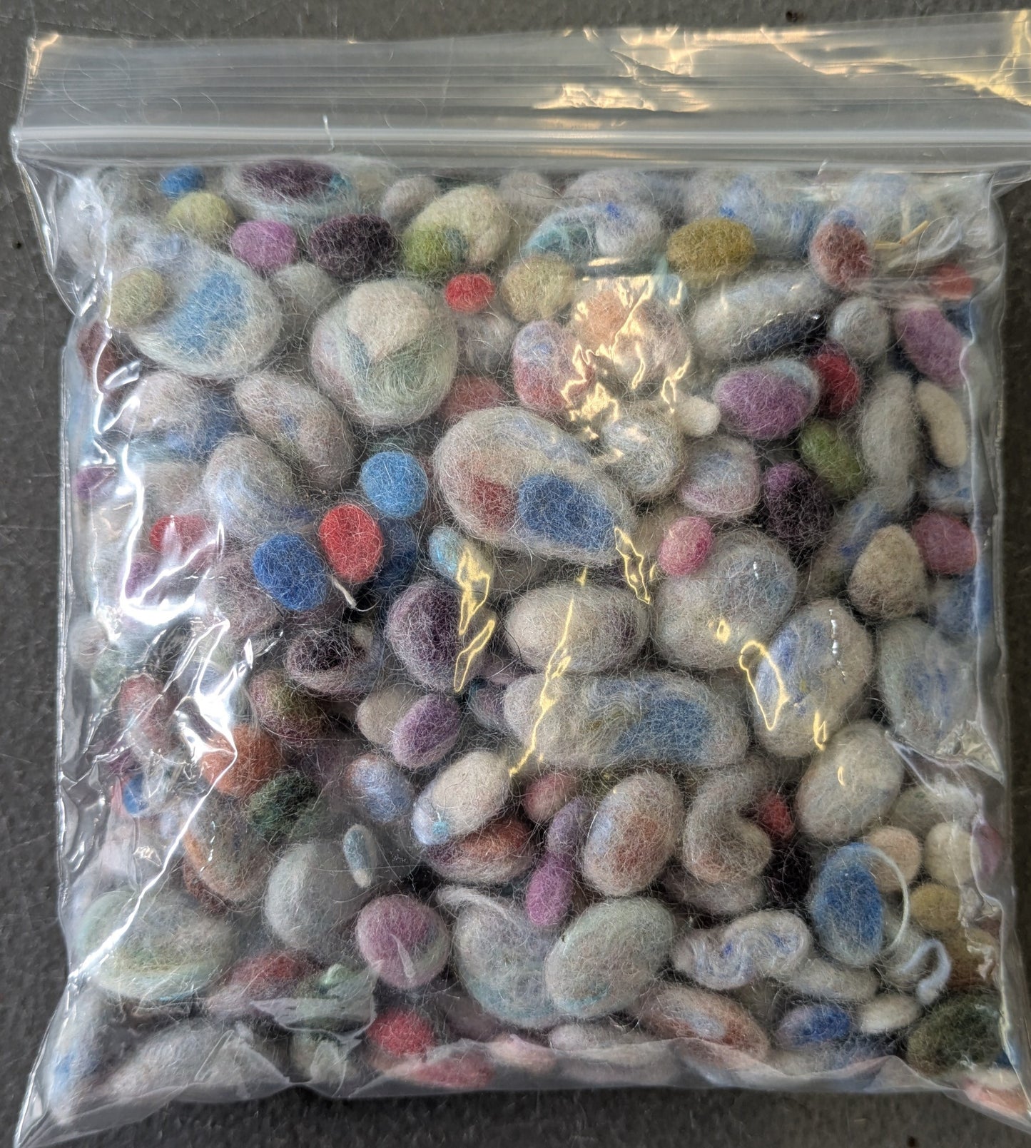 25g pebbles - mix of hand-dyed and natural fibres and fabrics made into little pebbles - pebs19