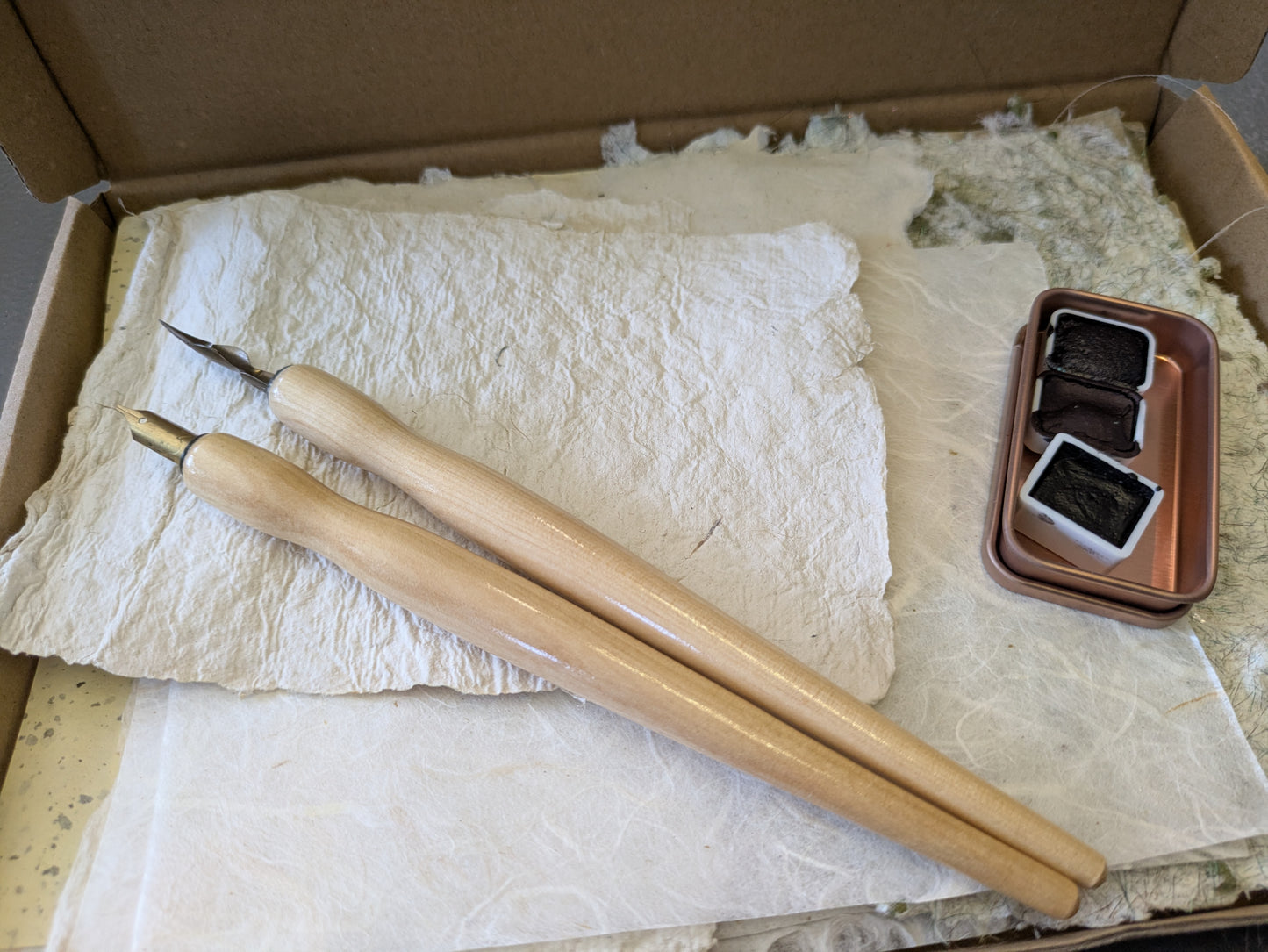Studio destash, A5 box of hand made papers, dip pens and hand made paint MMbox03