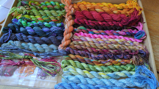 Assorted skeins of hand dyed silk threads,wool yarns, silk ribbons and raffia- a great mix of colours  - Box01