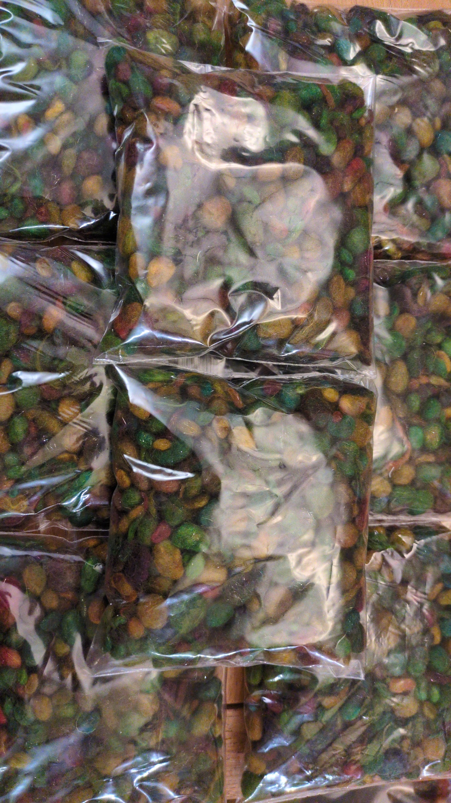 25g pebbles - mix of hand-dyed and sparkly fibres made into little pebbles - pebs25